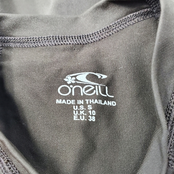 O'NEILL BROWN AND TEAL SHORT SLEEVE RASH GUARD SIZE SMALL - Picture 8 of 12